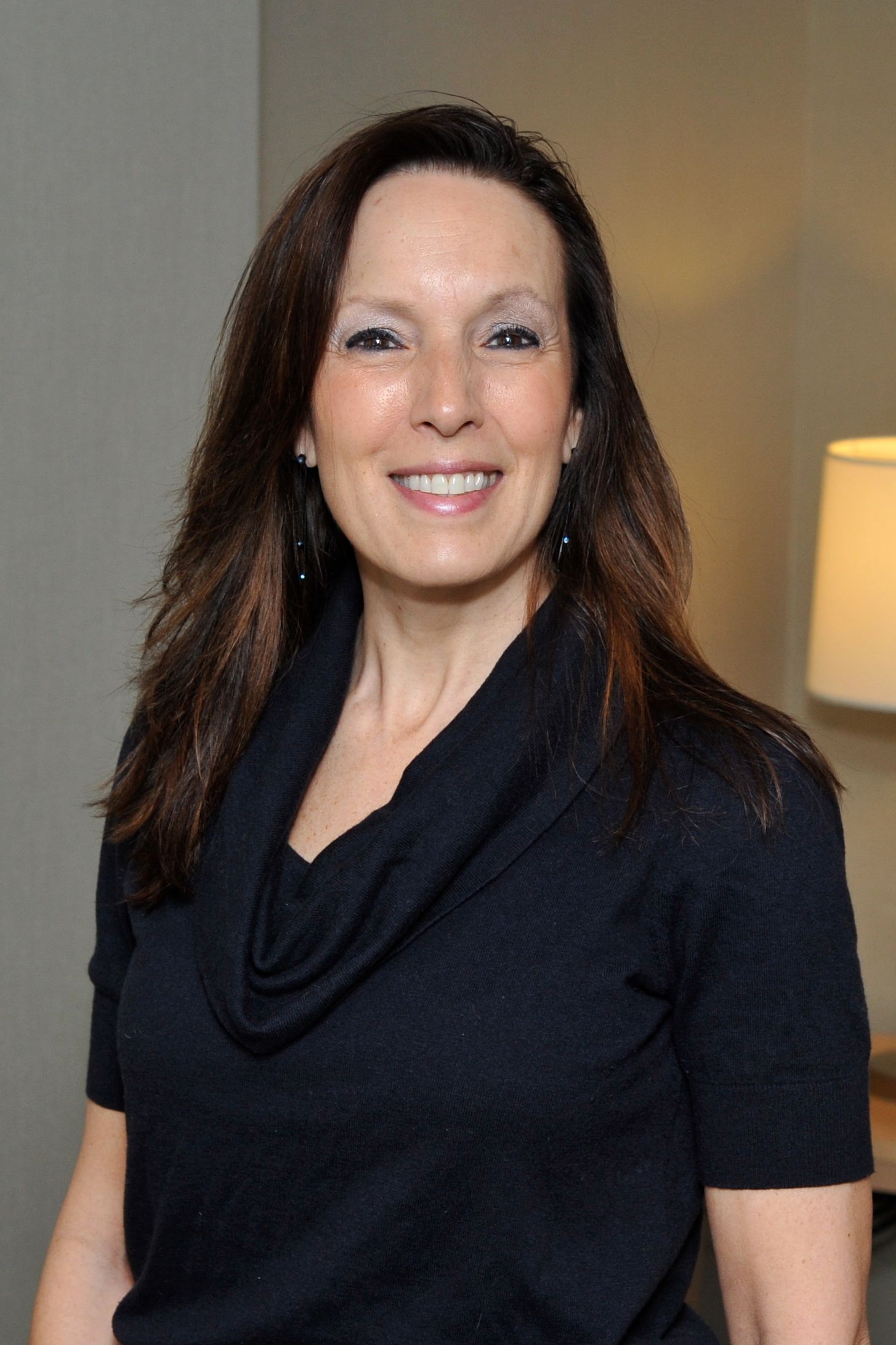 Lauraine Spano-Szekely, RN, wearing a black shirt